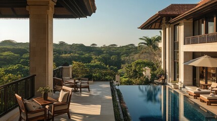 Fototapeta premium A luxurious resort balcony with wooden chairs and a matching table, offering a calming view of the lush garden below.