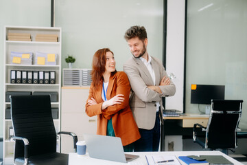 Portrait of success business people working together in modern office.