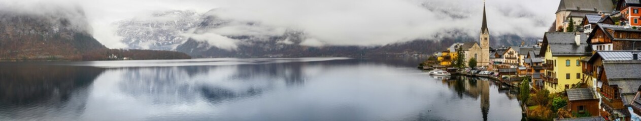 Historic Hallstatt, Austria. Beautiful lakeside village with colorful houses and stunning mountain...