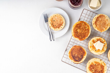 Traditional English skillet fried breakfast pastry Crumpets, popular in England, Britain pancakes....