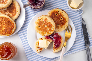 Traditional English skillet fried breakfast pastry Crumpets, popular in England, Britain pancakes....