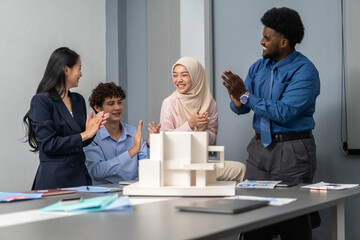 Diverse group business in formal attire smiling and clapping during a corporate meeting, celebrating success and achievements, diverse workplace environment with professional women engaged in teamwork