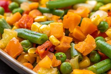 Mexican Mix of Vegetables. Tomatoes, Green Beans, Peas, Corn. Dietary Food.Bright vegetable mix .Vegetarian food.Assorted.