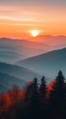 Obraz premium Autumn sunrise over layered mountains