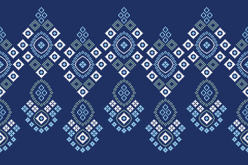 Ethnic pattern traditional motif ikat geometric fabric pattern cross stitch.Ikat embroidery Ethnic oriental Pixel blue background.Abstract,vector,illustration. Texture,decoration,wallpaper.