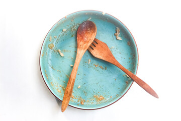 a dirty plate isolated on a white background