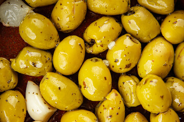 Mediterranean olives with garlic snack aperitif fresh tasty food dish delicious gourmet food...