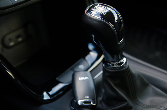 Close up of a modern car's gear stick and key fob - Powered by Adobe