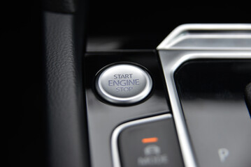 Close up of a car's push button start engine ignition system
