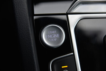 Close up of a car's start engine stop button