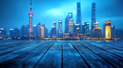 Empty wooden platform in front of a vibrant, illuminated, modern city skyline at dusk.