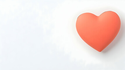 Coral heart, minimalist design, white background, Valentine's Day card, love symbol.