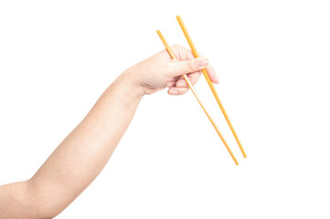 Female hand holding a orange plastic chopstick isolated on white background.