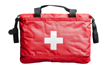 A bright red bag with a white cross emblem, containing a first aid kit, lies on a clean isolated on white background.PNG