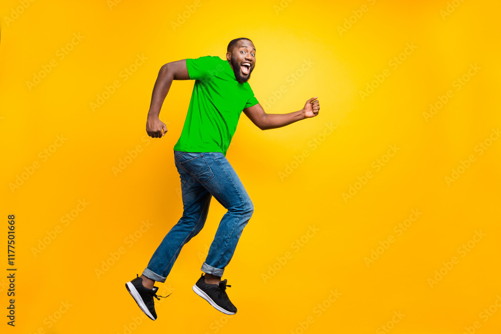 Poster full length body size photo of running man seeming to have done something bad and now trying to hide