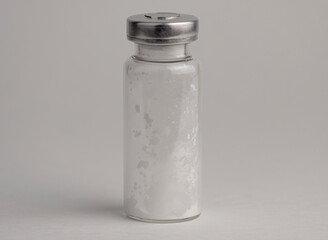 Simple glass vial with a metal cap