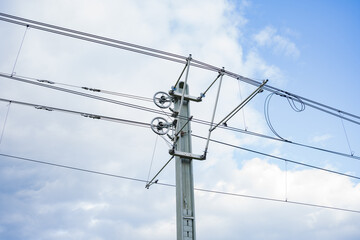 Pole support for electric wires for urban electric transport. Image of electric pole with wiring...
