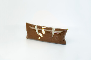 A Block of Jaggery Gud sakhar or Heated Chaku Made of ghee for Makar Sankranti Health Food Concept