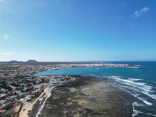 Aerial view of the coastline  with sea views and blue sky background. Taken in Fuerteventura. 
