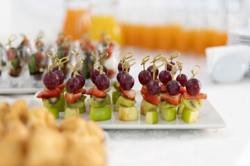 diet delicious snacks on skewers at a banquet