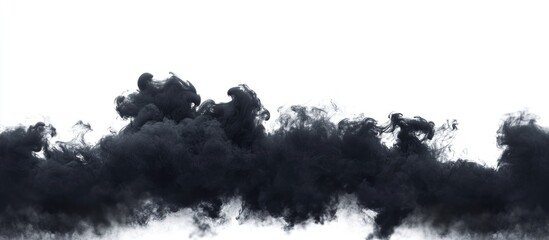 Fototapeta premium Black smoke abstract art isolated on white background offering ample space for creative text and design elements
