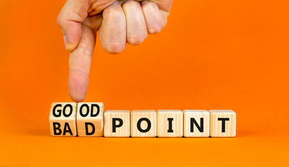 Good or bad point symbol. Concept words Good point Bad point on beautiful wooden blocks. Beautiful orange table orange background. Businessman hand. Business good bad point concept. Copy space
