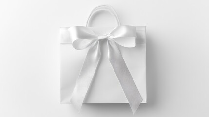 Glossy white gift bag with ribbon handles, photographed against a seamless white background, festive and chic.
