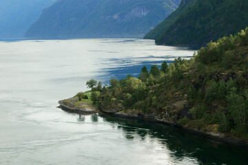 Majestic fjord landscape in serene afternoon light