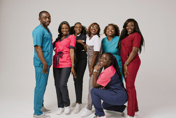 A Joyful Group of Healthcare Professionals Posing Together in Scrubs 