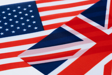 Flag United States America and Great Britain on white background. Closeup.
