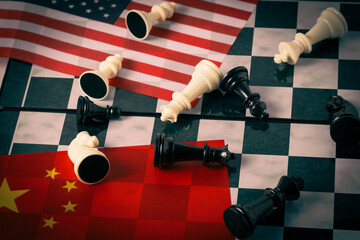 Chess pieces on flag China and United States America.