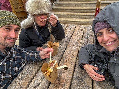 UGC POV winter selfie eating poutine