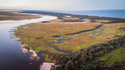  stunning aerial view of Jekyll Island, showcasing its lush greenery, sandy shores, and serene...