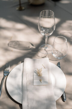 Elegant wedding table setting with delicate floral accents
