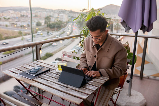 Businessman  in a jacket solves work issues