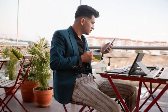 Businessman  in a jacket solves work issues