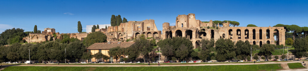 Obraz premium Panorama of the ancient ruin of Stadio Palatino from the Roman arena remains of Circo Massimo in Rome, Italy.