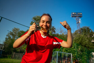 Female soccer player on a sports field