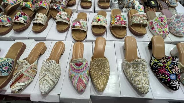 Profile view of handmade Indian juttis with beautiful work looking gorgeous.