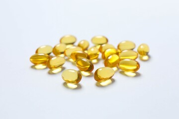 Capsule of omega 3, 6, 9 fish oil, vitamin, food supplement on white background 