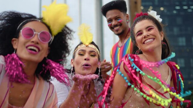 Joyful group of friends celebrating Brazilian Carnival with dance and laughter. Colorful costumes and vibrant energy highlight the festive street party