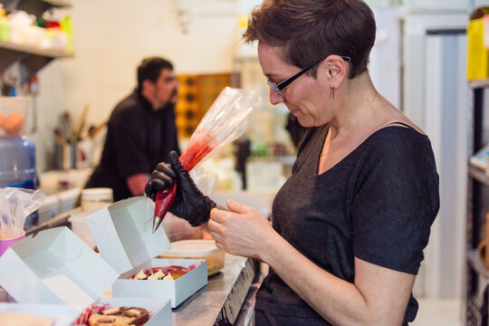 Busy Bakery kitchen: packaging orders