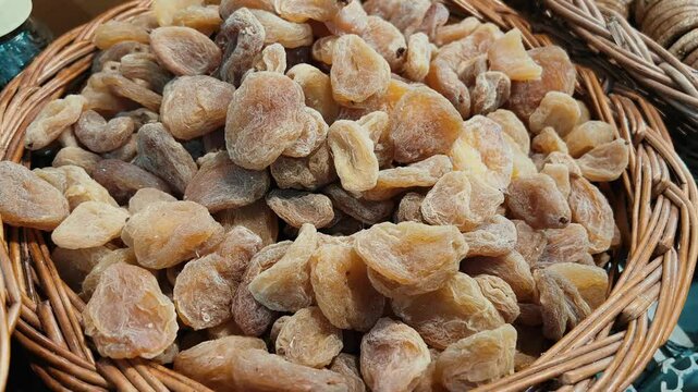 Profile view of basket full of amla candy.