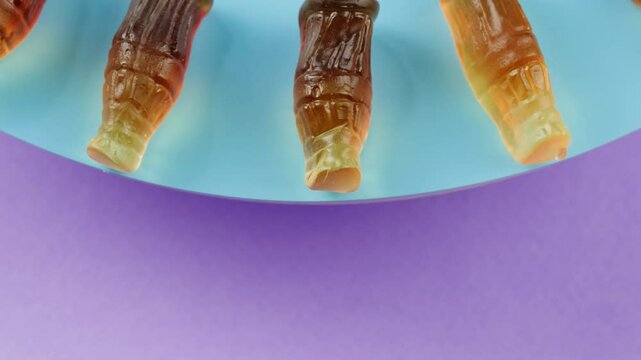 Jelly marmalade cola bottle bear close up, Confiture Bean candy jujube Marmalade bears with cod cannabis close up. 