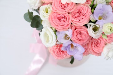 Beautiful wedding bouquet on light background, closeup. Space for text