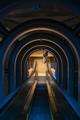 a tunneled escalator
