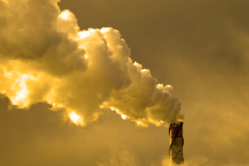 Smoke Stack at Factory or Power Plan Belching Pollution and Smoke into the Air Bad Environmental...