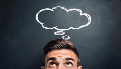 A thought bubble drawn on a chalkboard above a persons head symbolizing creative ideas