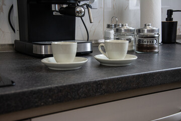 Cup of coffee in coffe machine