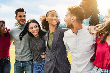 Happy group of people have fun together at park city, Young friends hug each other in summer day. Youth culture